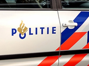 Foto van logo politie op auto