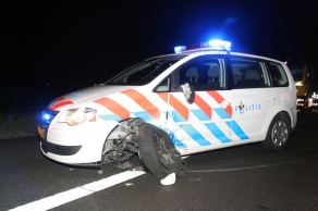Foto van politieauto op snelweg | Archief FBF.nl