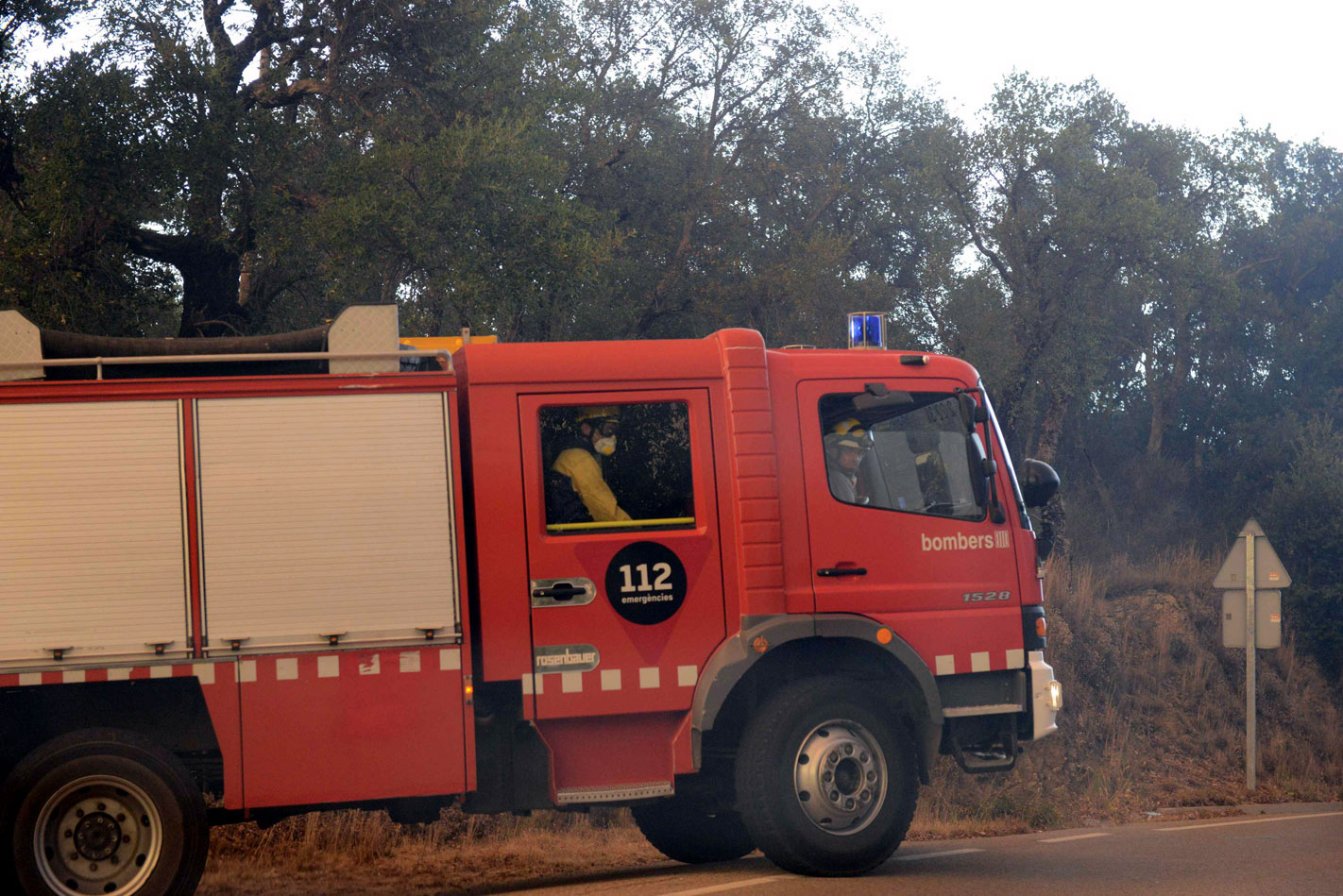 Toeristen op de vlucht voor bosbranden in Frankrijk en Spanje