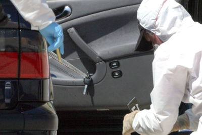 Foto van forensisch onderzoek bij auto | Archief EHF