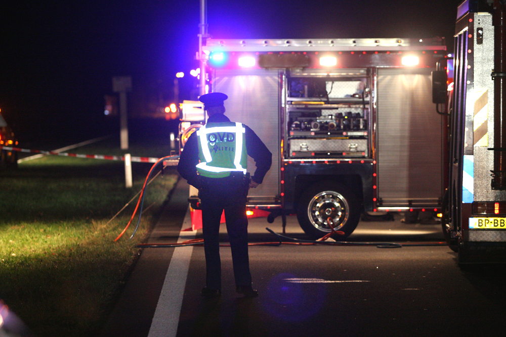 Foto van politie OVD bij ongeval in donker | Archief EHF
