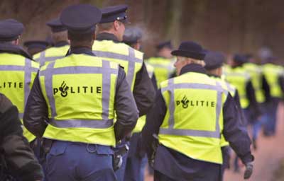Foto van politie in gele hesjes | Archief EHF