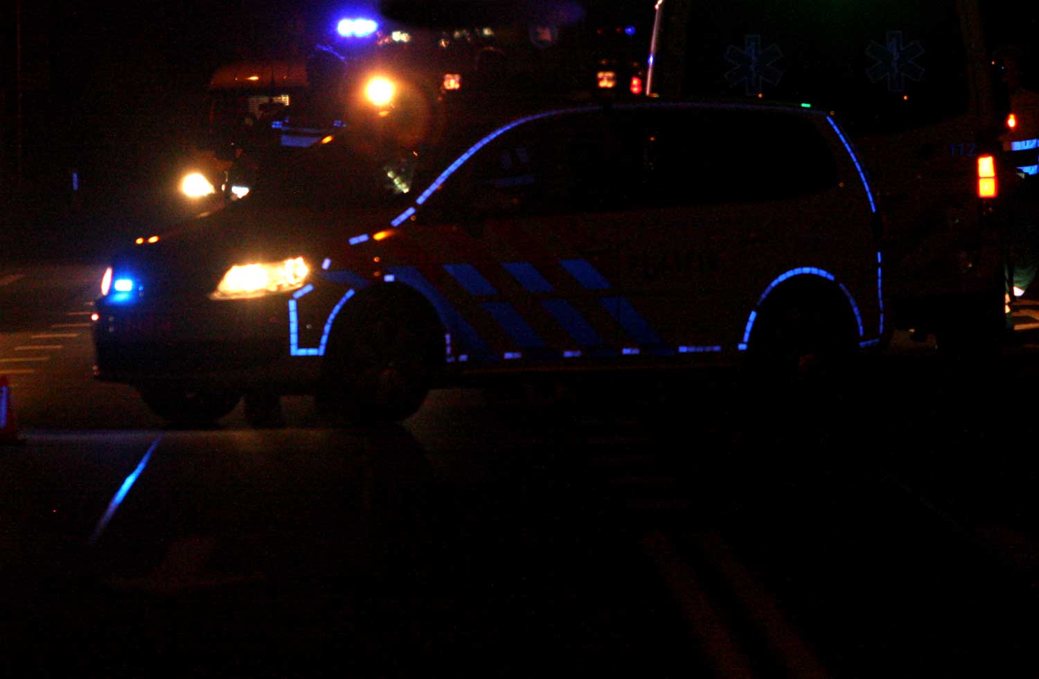 politieauto-donker-reflectie