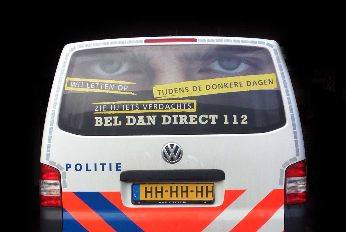 politiebus-ogen-slogan-112