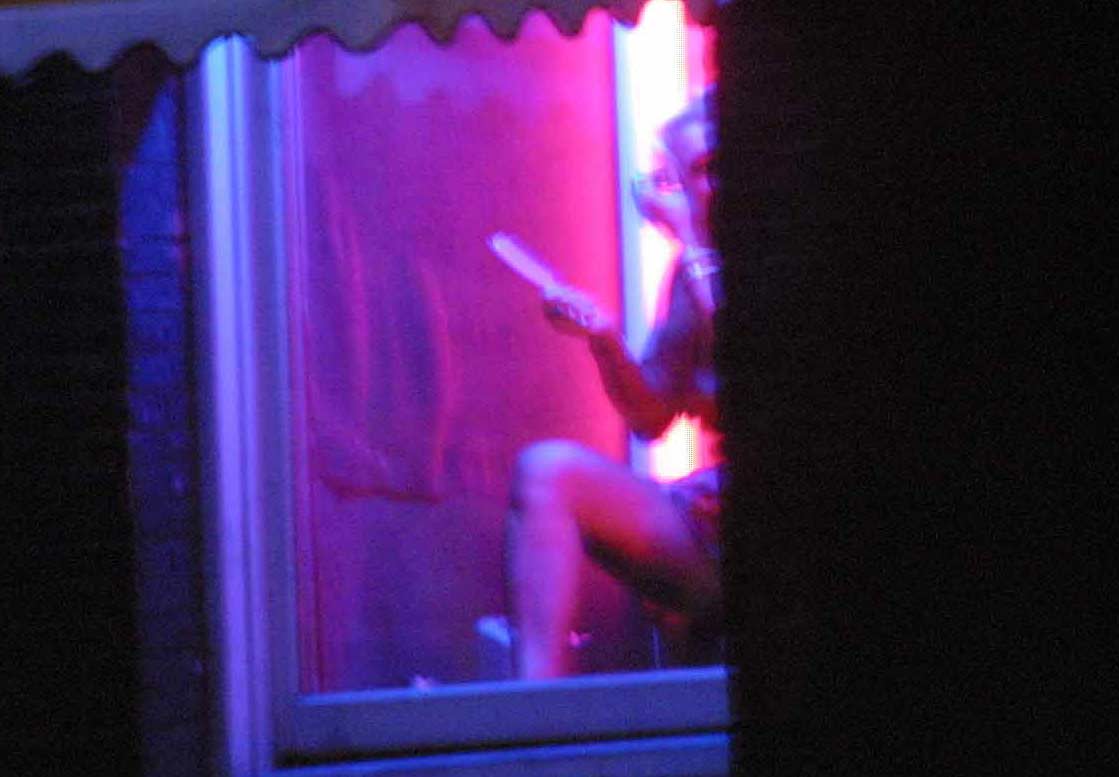 Prostitué in haar peeskamer