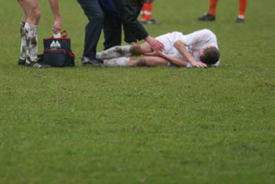 Foto van blessure bij voetbal | Archief EHF