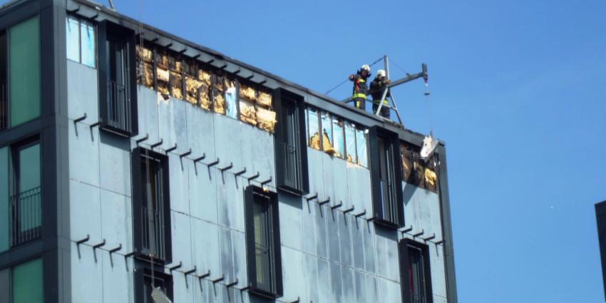 Foto van brand woon- en winkelcentrum Groningen | Bert van den Berg