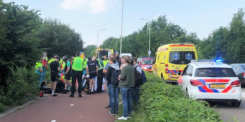 hulpdiensten bij gewonde wielrenner