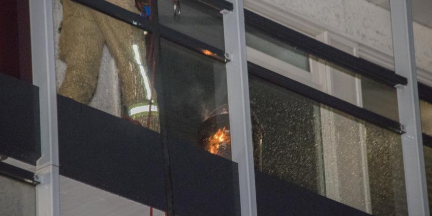 Prullenbak in woning in brand 