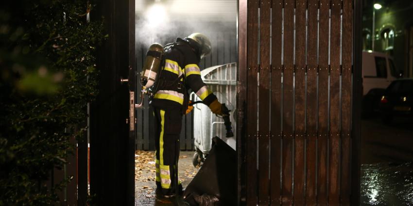 Afvalcontainer in containerhok in brand Bracbant Boxtel