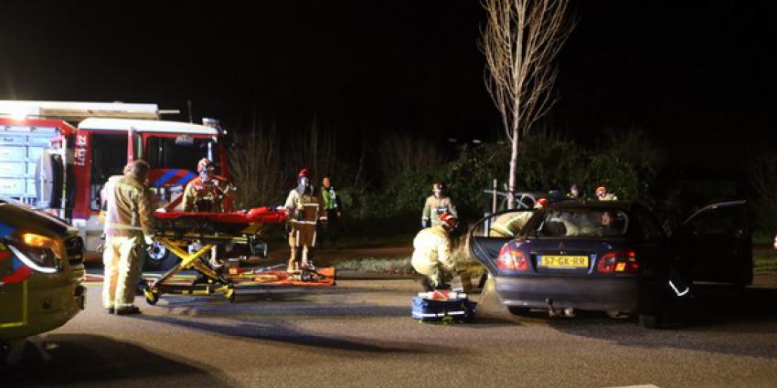 frontale aanrijding, drie zwaargewonden