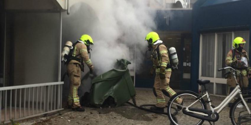 Middelbrand door brand in container