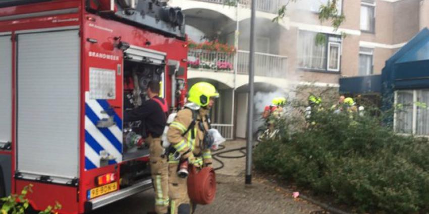 Middelbrand door brand in container