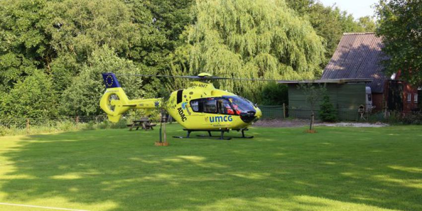 Man bekneld onder tractor in Buinen