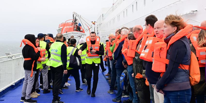 Evacués op dek Ferry