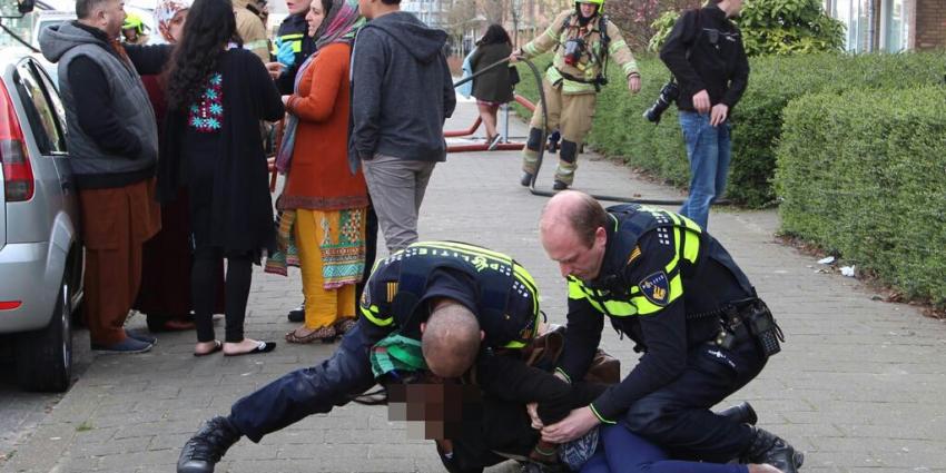 Vrouw aangehouden bij woningbrand in Schiedam