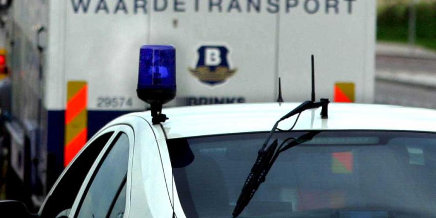 Foto van geldtransport en politieauto | Archief EHF