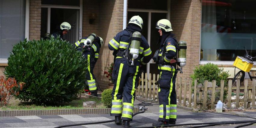 Buurman blust keukenbrand en haalt bewoner uit woning in Boxtel