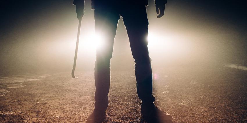 Foto van man met koevoet