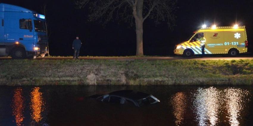 Auto te water in Muntendam