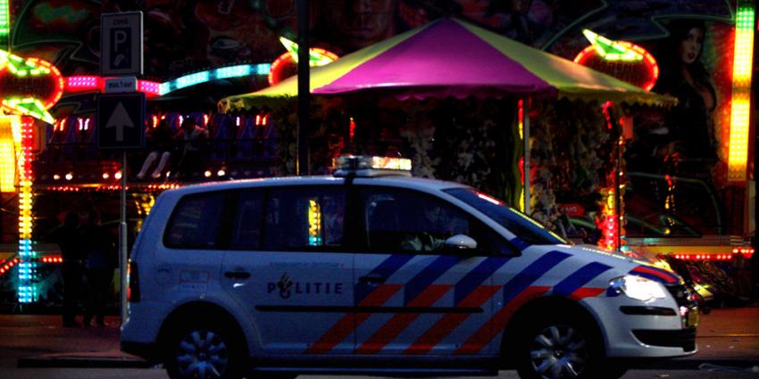 Foto van politieauto kermis donker | Archief EHF