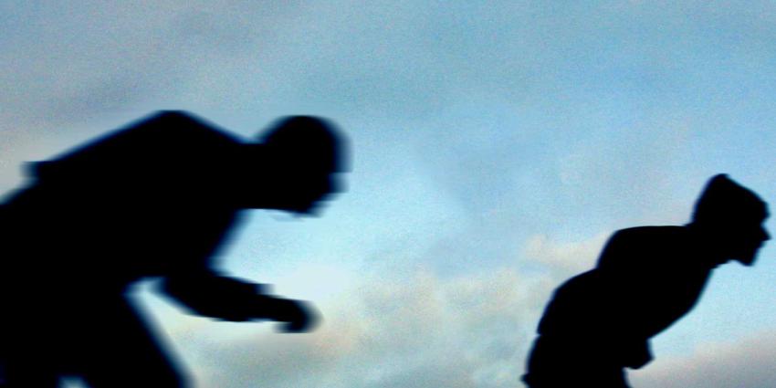 schaatsers-beweging-silhouet-donker