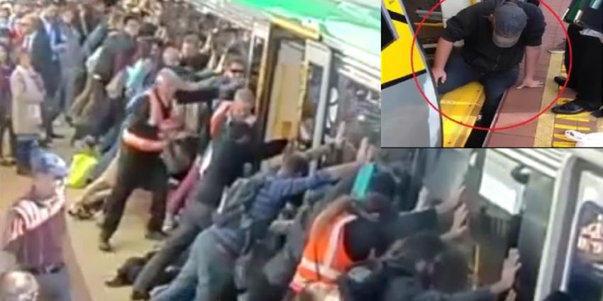 Passagiers kantelen treinstel om met been beknelde man te bevrijden