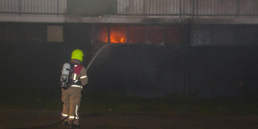 Uitslaande brand in kelderbox van flatgebouw Maassluis 