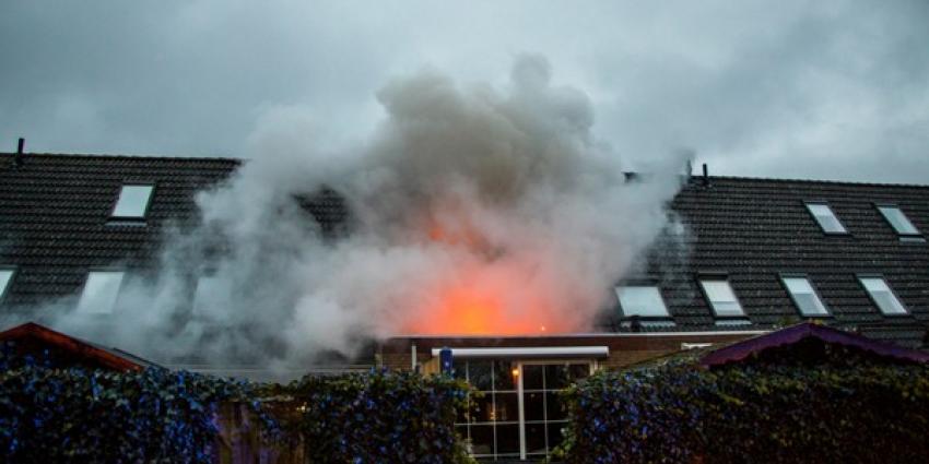 Uitslaande brand in woning Schiedam verwoest bovenverdieping 