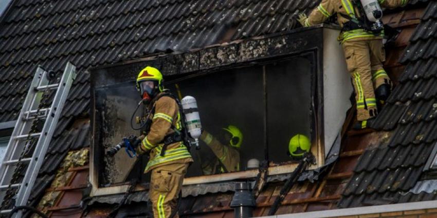 Uitslaande brand in woning Schiedam verwoest bovenverdieping 