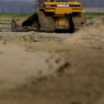 Graafmachine op zandgrond