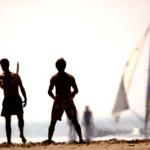 Foto van badgasten op het strand | Archief EHF