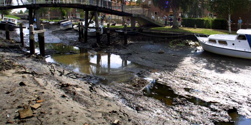 dijkdoorbraak-wilnis-brug-boot