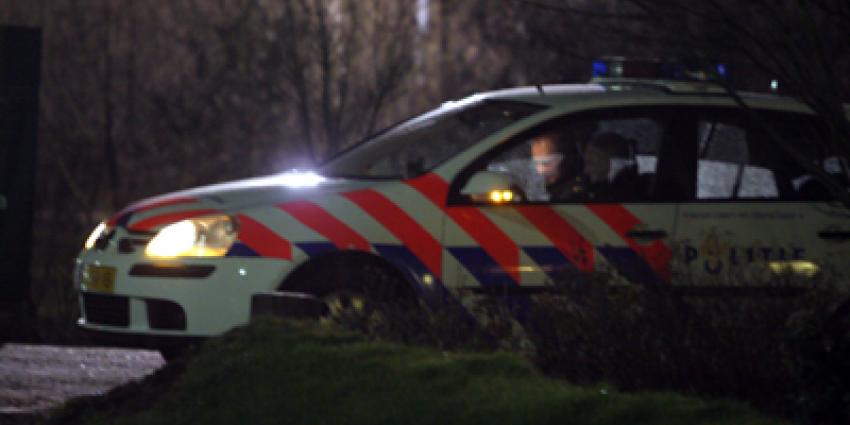 Foto van politie in auto in donker | Archief EHF