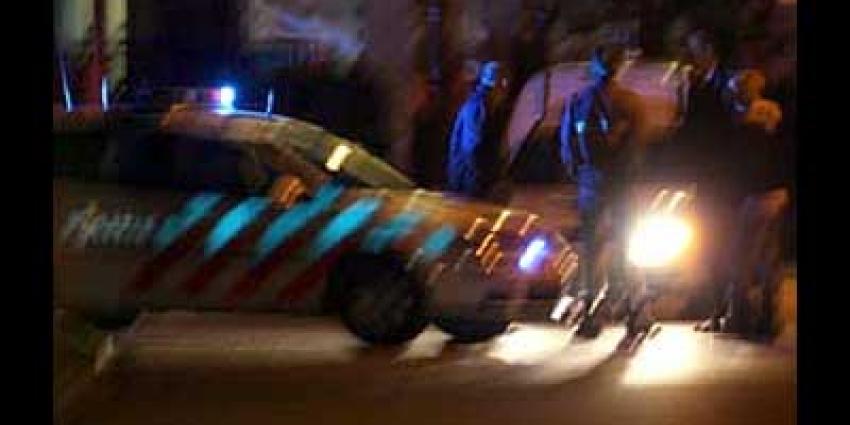 Foto van verdachten bij politieauto | Archief EHF