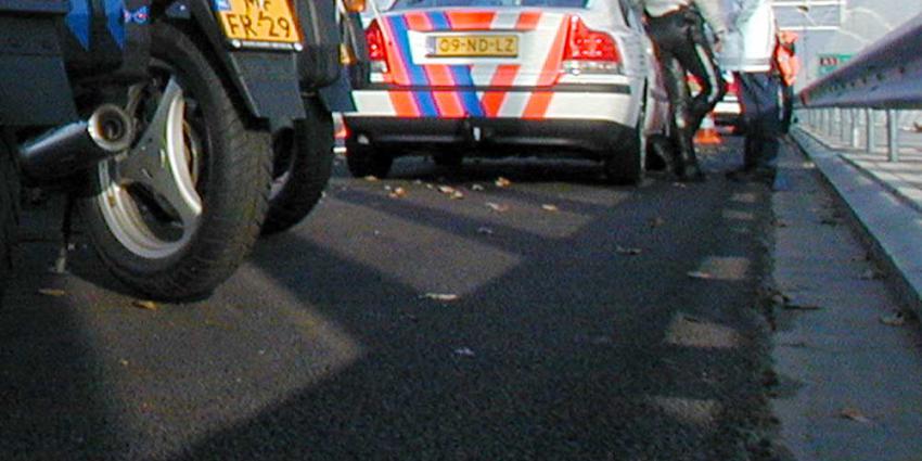 Foto van politie auto motor vluchtstrook snelweg | Archief EHF