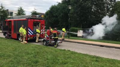 Brandweer blust brand in elektriciteitskast