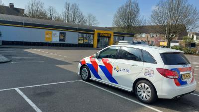 Politie bij supermarkt