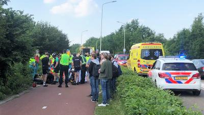 hulpdiensten bij gewonde wielrenner