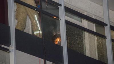 Prullenbak in woning in brand 