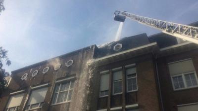 Brand op dak Fons Vitae Lyceum Amsterdam, 1 gewonde