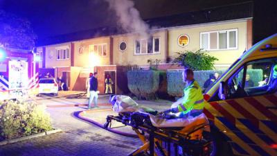 brandweer, redden, bewoners, hond, vogels, woningbrand 
