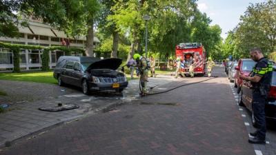  Brand in rouwauto