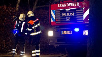 Foto van brandweer in donker | Archief Sander van Gils | www.persburosandervangils.nl