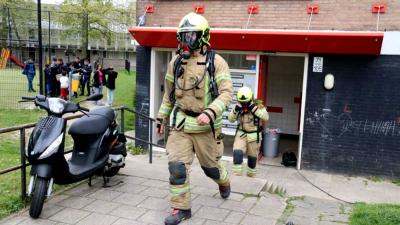 Kinderwagen in brand in flat