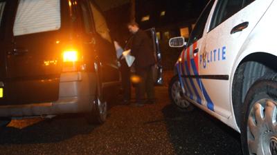 Foto van lijkwagen en politieauto | Archief EHF