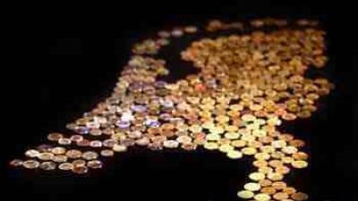 Foto van munten in vorm van Nederland | Archief FBF