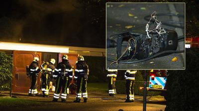 Brand garage door oplaadpunt elektrische auto