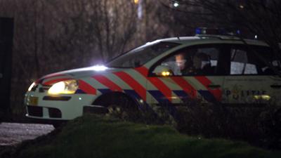 Foto van politie in auto in donker | Archief EHF
