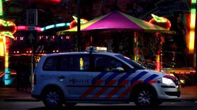 Foto van politieauto kermis donker | Archief EHF